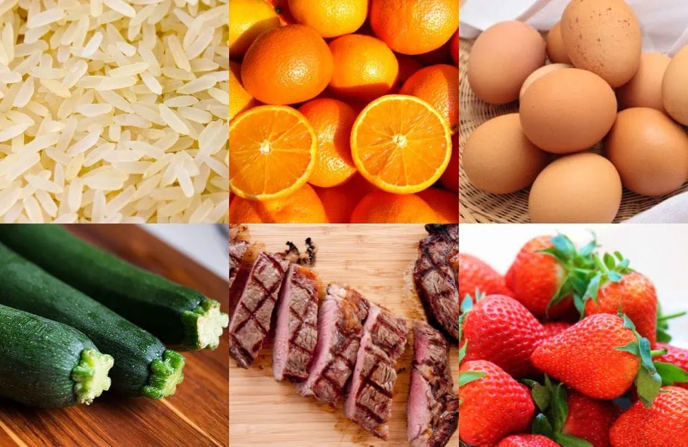 Un collage con riso, arance, uova, zucchine, carne e fragole, alimenti a basso indice di nichel o addirittura nichel free.